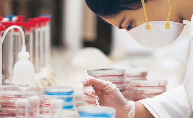 Laboratory employee carries out analysis