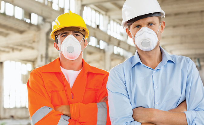 Workers wearing N95 respirators
