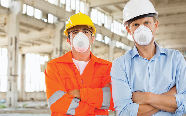 Workers wearing N95 respirators